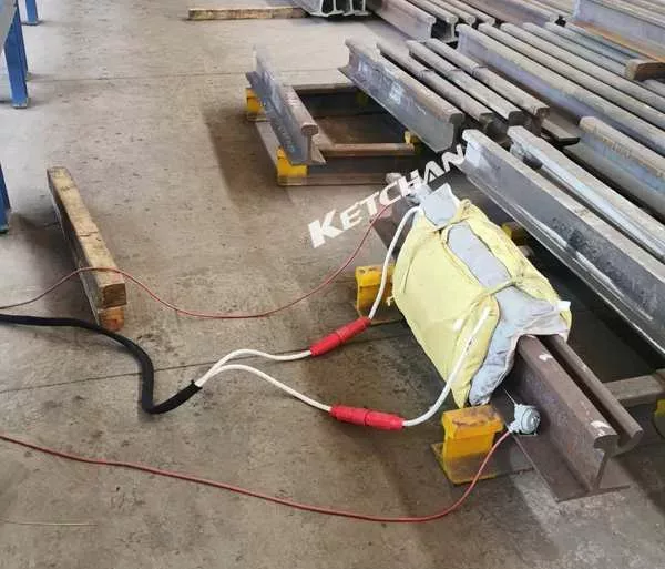 Portable air cooled induction preheating machine for rail application