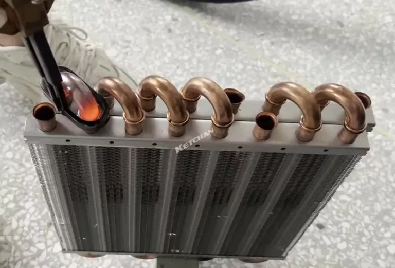 Handheld induction brazing of heat exchanger